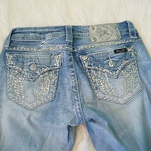 Light wash miss me signature skinny jeans